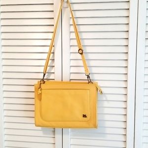 The Sak yellow leather crossbody purse